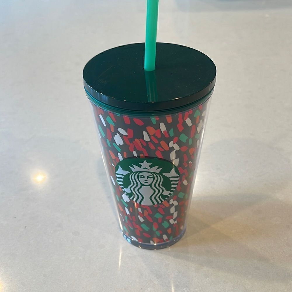 Starbucks new with tags cold cup with original straw. Excellent condition.